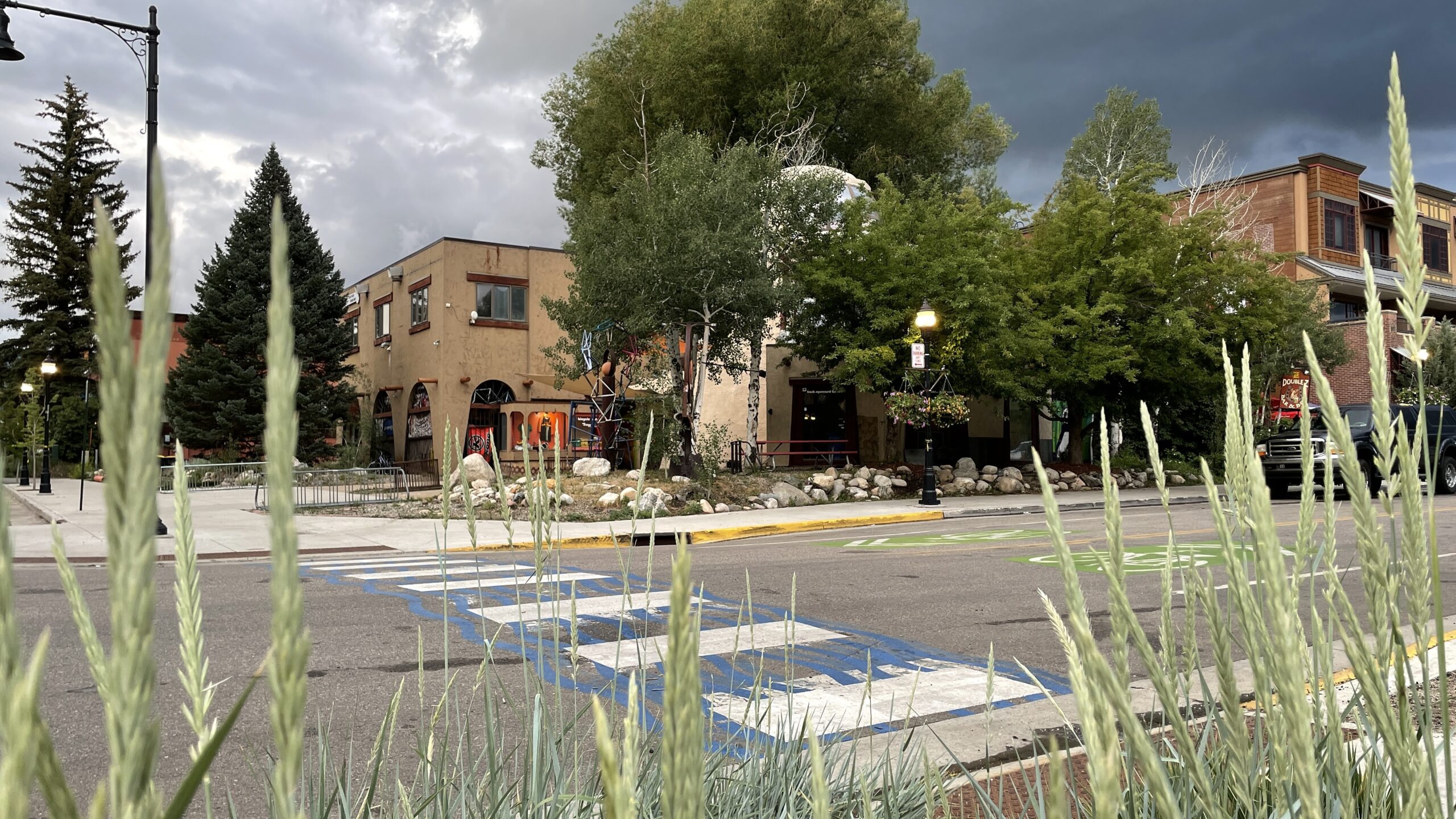 A crosswalk and sidewalks in Steamboat Springs, CO, to illustrate how walking is a great way to get into town.